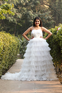 White Ruffled Trail Gown for Christian Wedding